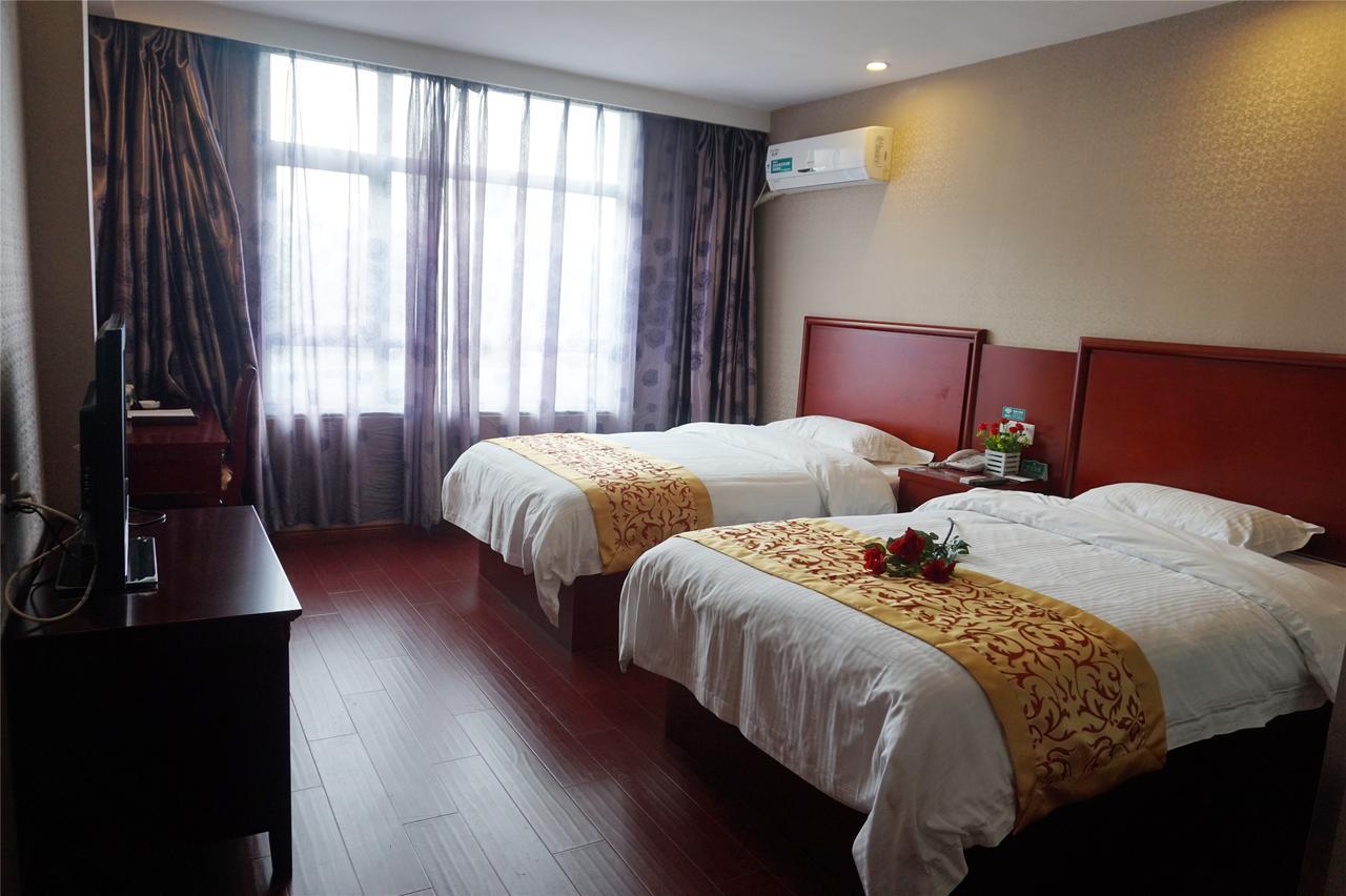 Greentree Inn Zhenjiang Yangzhong City Central Shopping Market North Gangdong Road Express Hotel Bagian luar foto